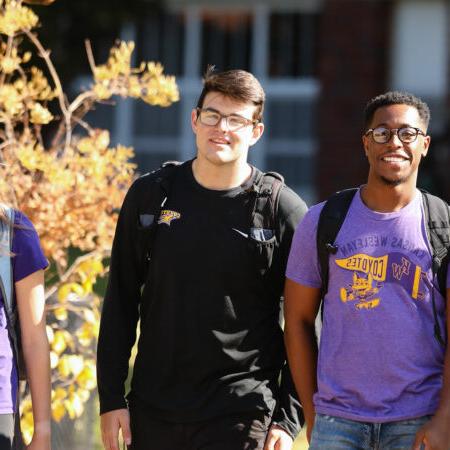 Students walking through campus